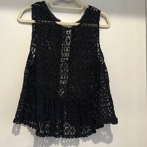 Black knit top from Anthropologie. Tie back. Cotton
